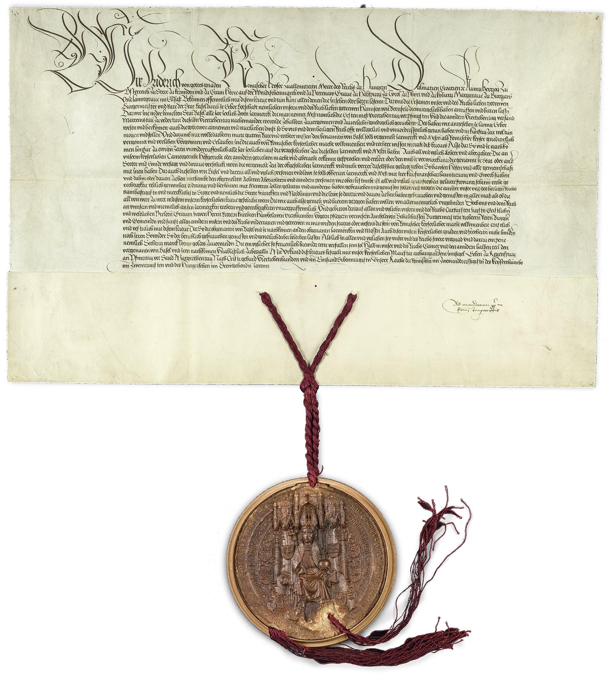 Document de l'attribution du privilège de foire à la ville de Bâle de 1471, en écriture calligraphiée avec le sceau de l'empereur Fréderic III.